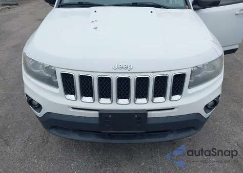 2016 Jeep Compass Sport z USA, uszkodzony, nr VIN 1C4NJCBA8GD664771